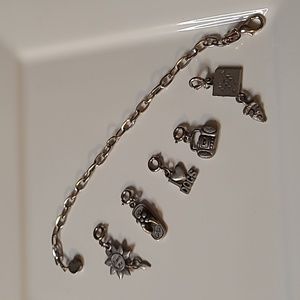 Vintage HIGH INTENSITY 5 removable Charm Bracelet